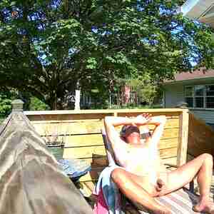 Sun tan Outside for the neighbors Nude cock